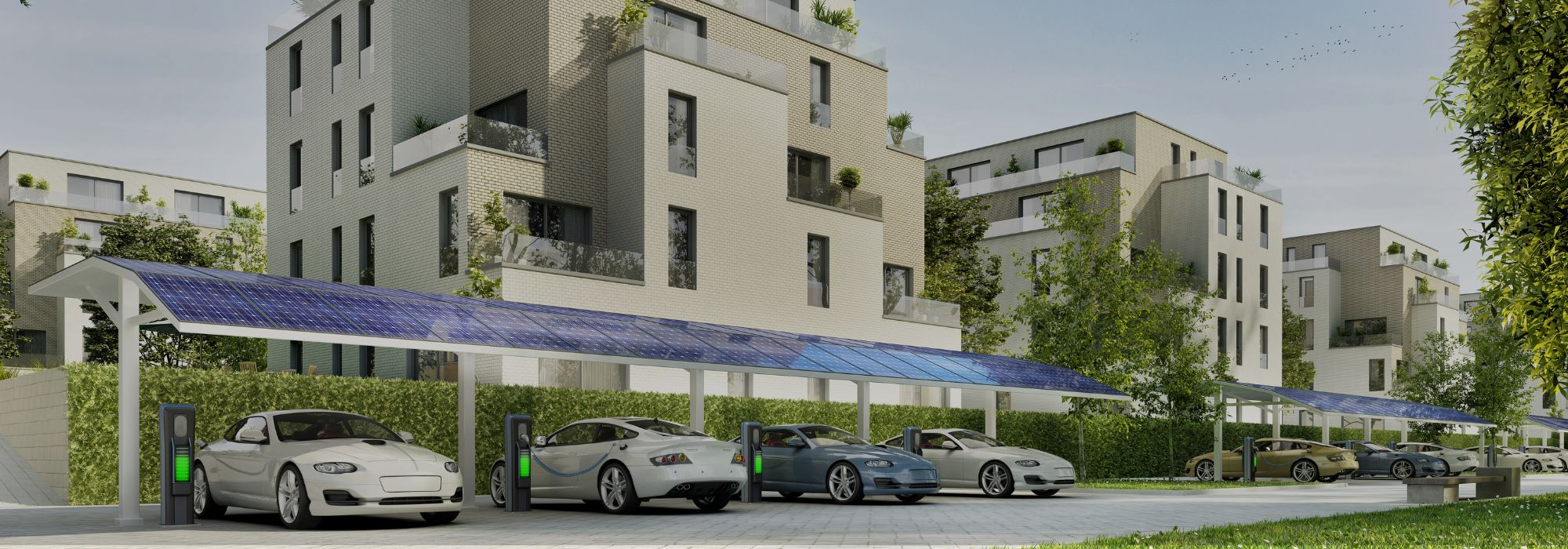 Vor einer Wohnanlage geparkte Autos